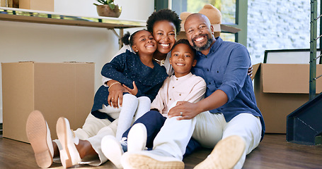 Image showing Moving, portrait and happy black family in home with boxes and hug in living room together. New house, property and smile for investment in real estate, growth and parents embrace children on floor