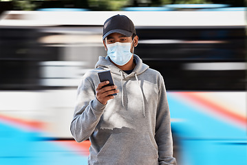 Image showing Man, mask or cellphone in city, bus and cold protection or text notification on travel in town. Young person, urban and medical cover on mouth for flu virus, transport safety and healthcare crisis