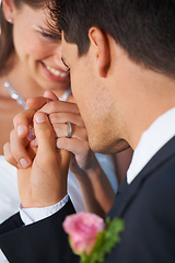 Image showing Couple, wedding ring and hand in marriage with bride and smile at celebration and trust event. Flower, loyalty and care with romance and holding hands with love and commitment with woman and man