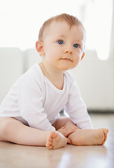 Image showing Home, playing and young baby on floor to relax, resting and calm in nursery learning to crawl in morning. Family, youth and infant newborn in bedroom for child development, growth and wellness