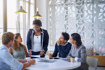 Image showing Business people, meeting and discussion in office for planning, collaboration and documents or happy. Employees, men and women at corporate workplace with communication and brainstorming with smile