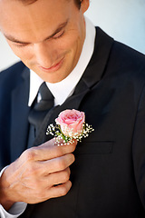 Image showing Groom man, boutonniere or flowers on suit for style for pride, smile or ready at wedding, party or celebration. Person, excited or rose on tuxedo for thinking, preparation or happy for marriage event