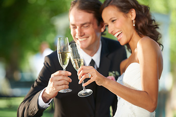 Image showing Outdoor, champagne and bride with groom, hug and support with relationship, romance and celebration. Romantic, outside or man with woman, marriage or happiness with love, cheers or wedding with smile