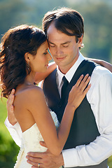 Image showing Outdoor, wedding and bride with groom, hug and support with relationship, romantic and celebration. Romance, outside and man with woman, embrace and commitment with love, bonding together or marriage