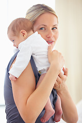 Image showing Mother, holding and bonding hug with baby for love, care support and gratitude for wellness with commitment. Woman, smile and cute newborn with blonde hair, blue eyes and kindness with trust safety