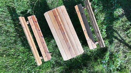 Image showing Rustic wooden picnic table in the backyard top view