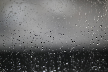 Image showing Water drops on fogged glass with a gray brightness gradient