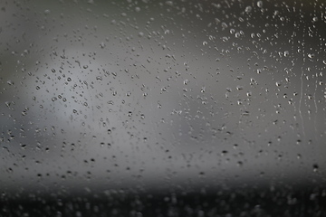 Image showing Water drops on fogged glass with a gray brightness gradient