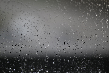 Image showing Water drops on fogged glass with a gray brightness gradient