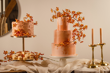 Image showing Tall peach colored wedding cake