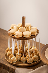 Image showing Sweet chocolate cake pops and macarons