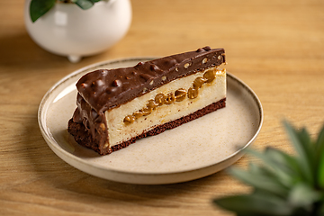 Image showing Piece of tasty chocolate nougat cake