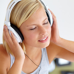 Image showing Home, headphones and woman with music, peace and streaming sound with radio, listen and calm. Zen person, technology or girl with headset, podcast audio and playlist with connection, song and bed