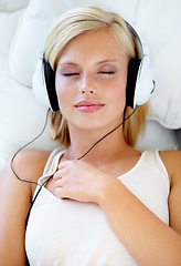 Image showing Home, headphones and woman with music, streaming sound and listening with radio, peace or calm. Zen person, technology or girl with headset, podcast audio or playlist with connection, bedroom or song