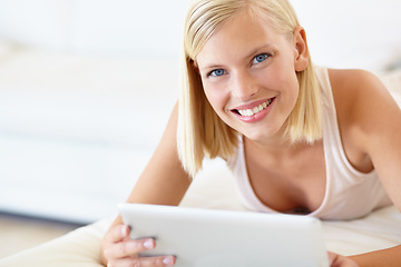 Image showing Relax, tablet and portrait of woman on bed for social media, online shopping and internet in bedroom. Relax, home and person on digital tech for reading website, news blog and research in morning