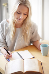 Image showing Research, coffee and woman writing in a book at home for idea, planning or creative, goal or study notes. Notebook, education or lady student in house with tea while brainstorming homework assignment