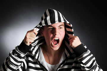 Image showing Guy in striped clothes