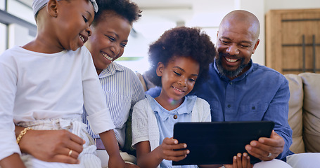Image showing Black family, parents or children with tablet and smile on sofa for games, streaming or elearning in living room of home. People, man and women or touchscreen, happy or technology for watching movie