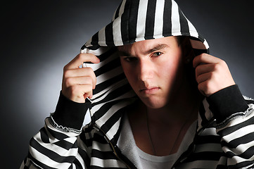 Image showing Guy in striped clothes