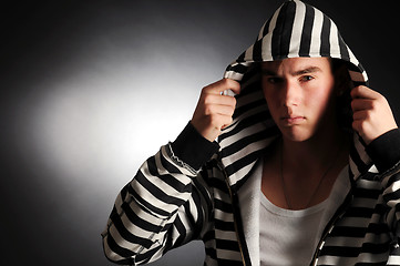 Image showing Guy in striped clothes