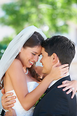 Image showing Groom, bride and wedding day hug outdoor with love, care and excited for commitment, union or trust. Love, happy and couple embrace outside marriage ceremony with support, security or romantic event