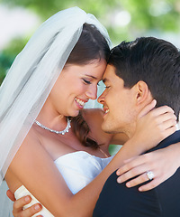 Image showing Wedding day, hug and happy couple outdoor for love, celebration and romantic life event. Face, smile and bride embrace groom outside with support, care and trust, security or excited for their future