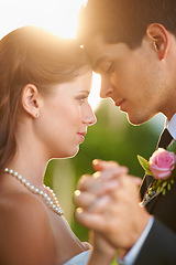 Image showing Wedding day, dance and bride and groom holding hands with love, trust and solitude, security and respect. Marriage, commitment and couple together and ceremony for romantic, celebration or gratitude