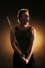 Image showing Guy with a sword