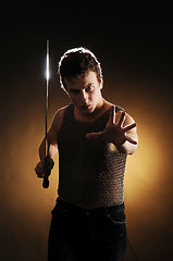 Image showing Guy with a sword