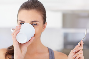 Image showing Portrait, happy and a young woman drinking coffee in the kitchen of her home to wake up in the morning. Face, wellness and time off with a person in an apartment to enjoy a warm caffeine beverage