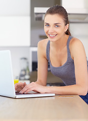 Image showing Portrait, laptop and online shopping with a woman in the kitchen of her home for ecommerce in the morning. Computer, credit card and bank with a happy young person in an apartment for payment