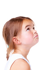 Image showing Face, sad and thinking with a girl child feeling alone in studio isolated on white background. Mental health, depression and emotion with a young kid looking up on space or mockup for disappointment