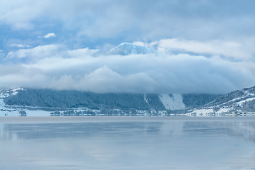 Image showing Serene Winter s Sea Scene With Snow-Capped Mountain and Reflecti