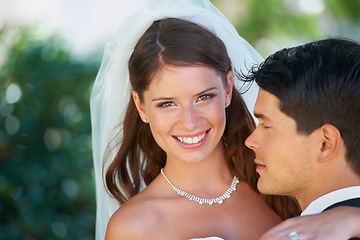 Image showing Portrait, bride and groom embrace at wedding with smile, love and commitment at reception. Garden, face of woman and man hugging at marriage celebration with happiness, loyalty and future together.