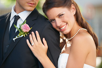 Image showing Bride woman, hug groom and portrait with smile, diamond ring and excited with love, care and fresh start. Couple, wedding and commitment to marriage in summer, outdoor and together for celebration