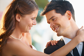 Image showing Bride woman, hug groom and wedding with smile, care and excited with love, care and fresh start in sunshine. Couple, memory and commitment to marriage in summer, outdoor and together for celebration