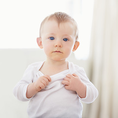 Image showing Home, bed and portrait of baby relax, resting and calm in nursery for health or wake up in morning. Family, youth and face of infant newborn in bedroom for child development, growth and wellness