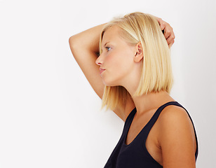 Image showing Depression, thinking and profile of woman, sad and tired in studio isolated on a white background mockup space. Serious, frustrated person and girl with trauma anxiety, mental health crisis or stress