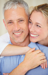 Image showing Happy couple, portrait and hug for love, support or care in romance together on holiday weekend at home. Face of mature married woman hugging man with smile in embrace, bonding or honeymoon at house