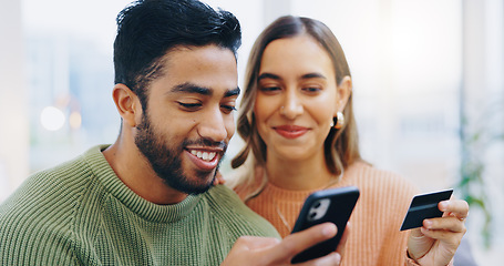 Image showing Love, phone and couple with credit card in a house for loan, payment or savings, budget or growth. Home, investment and people with smartphone for online shopping, sale or ecommerce, app and sign up