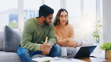 Image showing Laptop, documents and couple on sofa for taxes, online banking and budget payment. Living room, home and man and woman help with paperwork, bills and computer for insurance, savings and finances