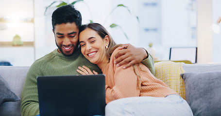 Image showing Couple, love and smile with laptop on sofa to watch movies, comedy subscription and online shopping at home. Happy man hug interracial woman at computer to download funny multimedia show in lounge