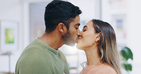 Image showing Love, kiss and couple in a house with care, trust or security, bond or happy relationship moment. Passion, date or people in a living room with respect, gratitude or soulmate connection at home