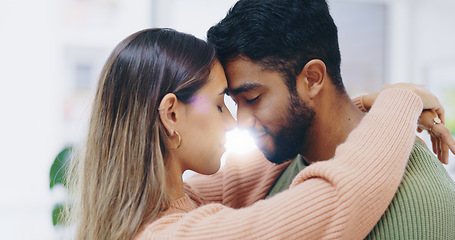 Image showing Couple, forehead and hug in home for love, support and care of trust, romance and gratitude of soulmate. Face of happy man, interracial woman and together for peace, loyalty and commitment to partner