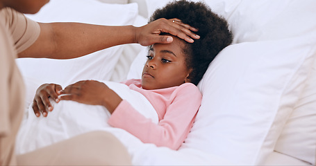 Image showing Hands check sick child in bedroom, temperature and covid allergies in family home. Parent, closeup and kid with fever in bed, touch forehead and care for girl with cold, virus and bacteria disease