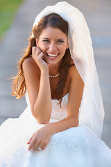 Image showing Bride, woman and portrait with smile for wedding, ceremony or celebration outdoor in nature for commitment. Marriage, person and face with dress, joy or happy for event, unity and romance in park