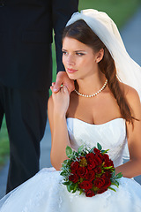 Image showing Woman, bride and roses while holding hands with groom in wedding dress, marriage or commitment in outdoor love together. Attractive female person or fiance getting married at bridal event or ceremony