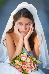 Image showing Wedding, woman and bride with bouquet for thinking, unhappy and disappointed with ceremony, commitment or event. Marriage, person and face with feeling down, sadness and gloomy outdoor in nature