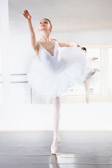 Image showing Art, dance and teen student in ballet studio with pose, balance and performance class for teenager. Movement, talent and young ballerina dancer with pride, confidence and creative at learning academy