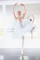 Image showing Smile, dance and teen student in ballet studio with pose, balance and performance class for teenager. Movement, talent and young ballerina dancer with pride, confidence and creative show at academy.